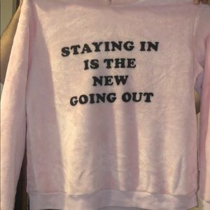 “Staying in is the new going out” fuzzy sweatshirt